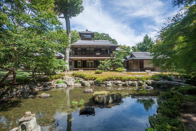 Family Mitsui House Museum with green tea admission ticket - Matcha on tatami, with the garden in view