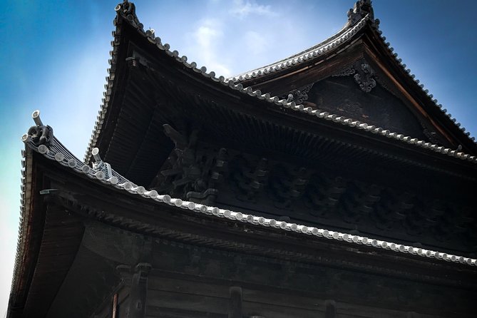 Hidden Kyoto E-Biking tour - Kitano Tenmangu and local religious tradition