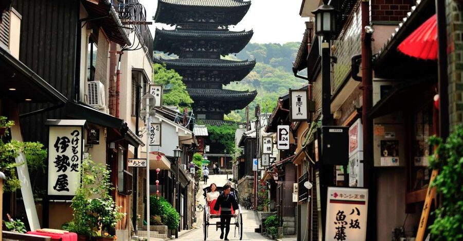 Higashiyama | Kyoto: Sakura Season Private Rickshaw Tour - Riding past wooden townhouses and old shops