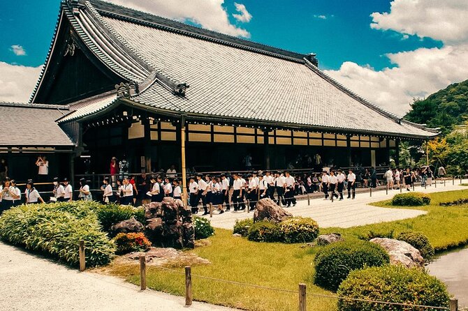 Kyoto: Arashiyama Bamboo Forest, Monkeys, Matcha & Temple Tour - Togetsukyo Bridge gives the route its river view