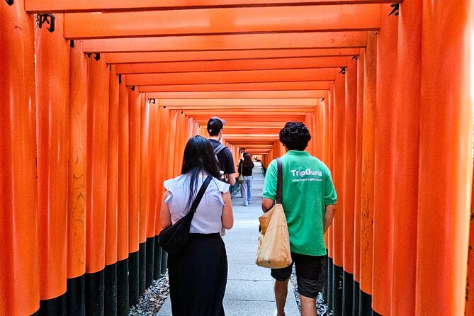 Kyoto: Fushimi Inari Taisha Small Group Guided Walking Tour - The lower shrine area and first torii gates