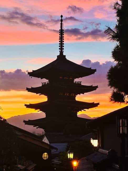 The Yasaka pagoda in silhouette against a Kyoto sunset