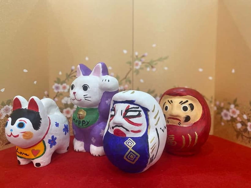 Kyoto: Make Your Own "Daruma" Craft & Painting Workshop - Entering the boutique workshop with May
