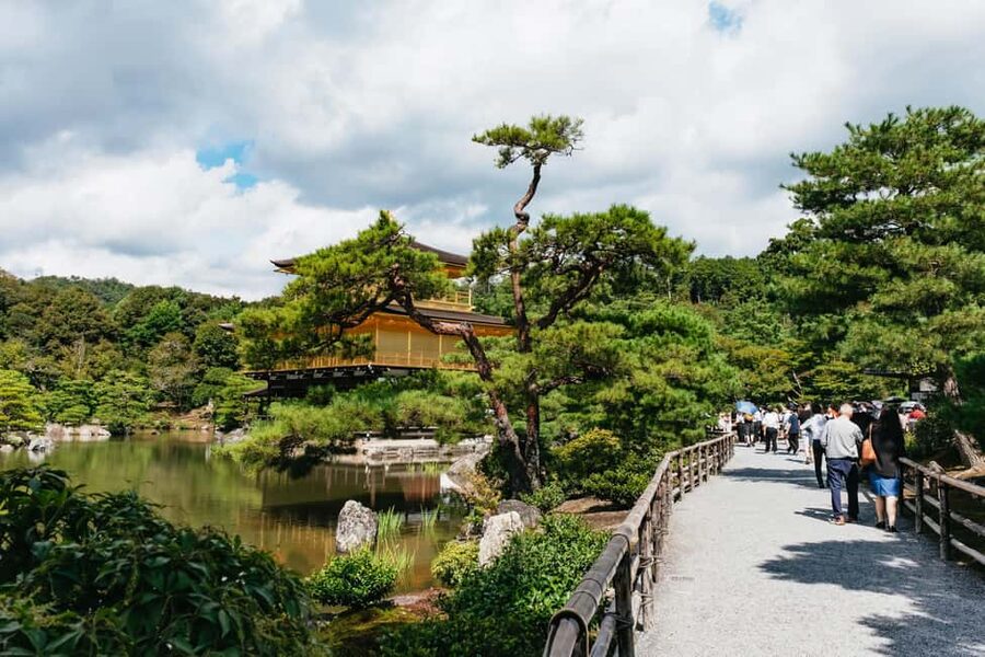 Kyoto: Nijo Castle, Kiyomizu & Fushimi Inari Guided Tour - Kinkaku-ji and its gold-leaf reflection
