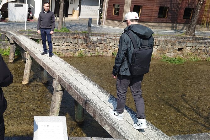 Start from Kyoto Station: Early Morning E-Bike Tour with Kyotoite - Returning beside the Kamogawa River