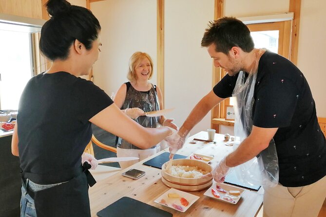 The Original Small-Group Sushi Making Class in Kyoto - Shaping nigiri with direct guidance
