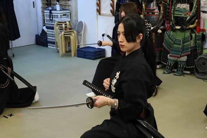Train Katana with Real Dojo Students in Kyoto - Practicing kenjutsu with a small group