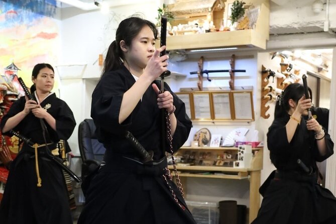 Train Katana with Real Dojo Students in Kyoto - Watching rolled tatami mats meet a real katana