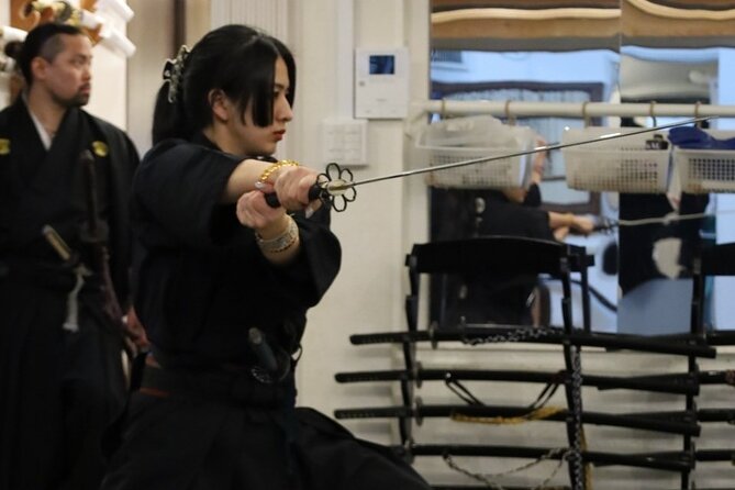 Train Katana with Real Dojo Students in Kyoto - The headmaster’s two-katana performance